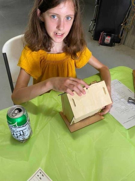Kids planting flowers