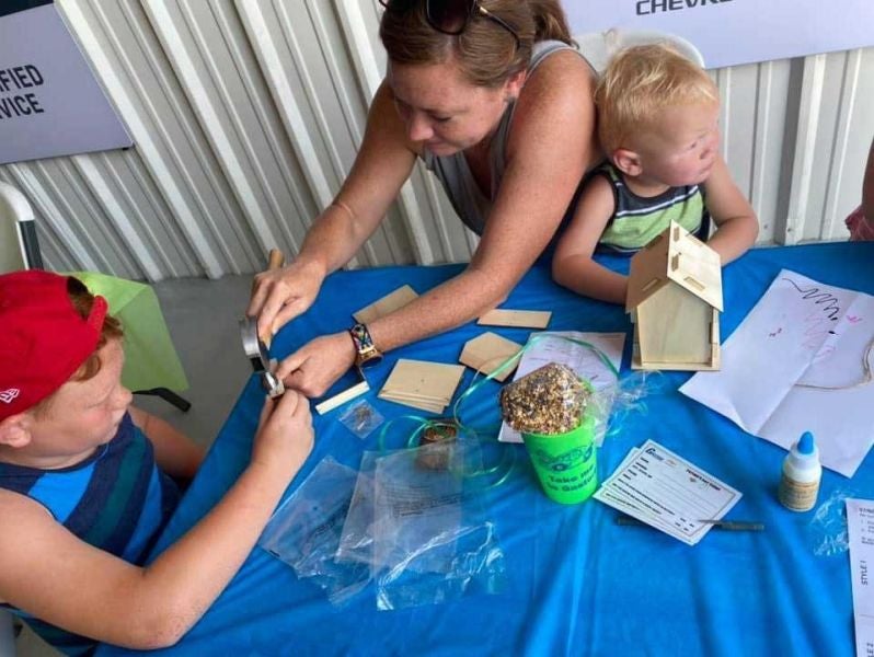 Kids planting flowers